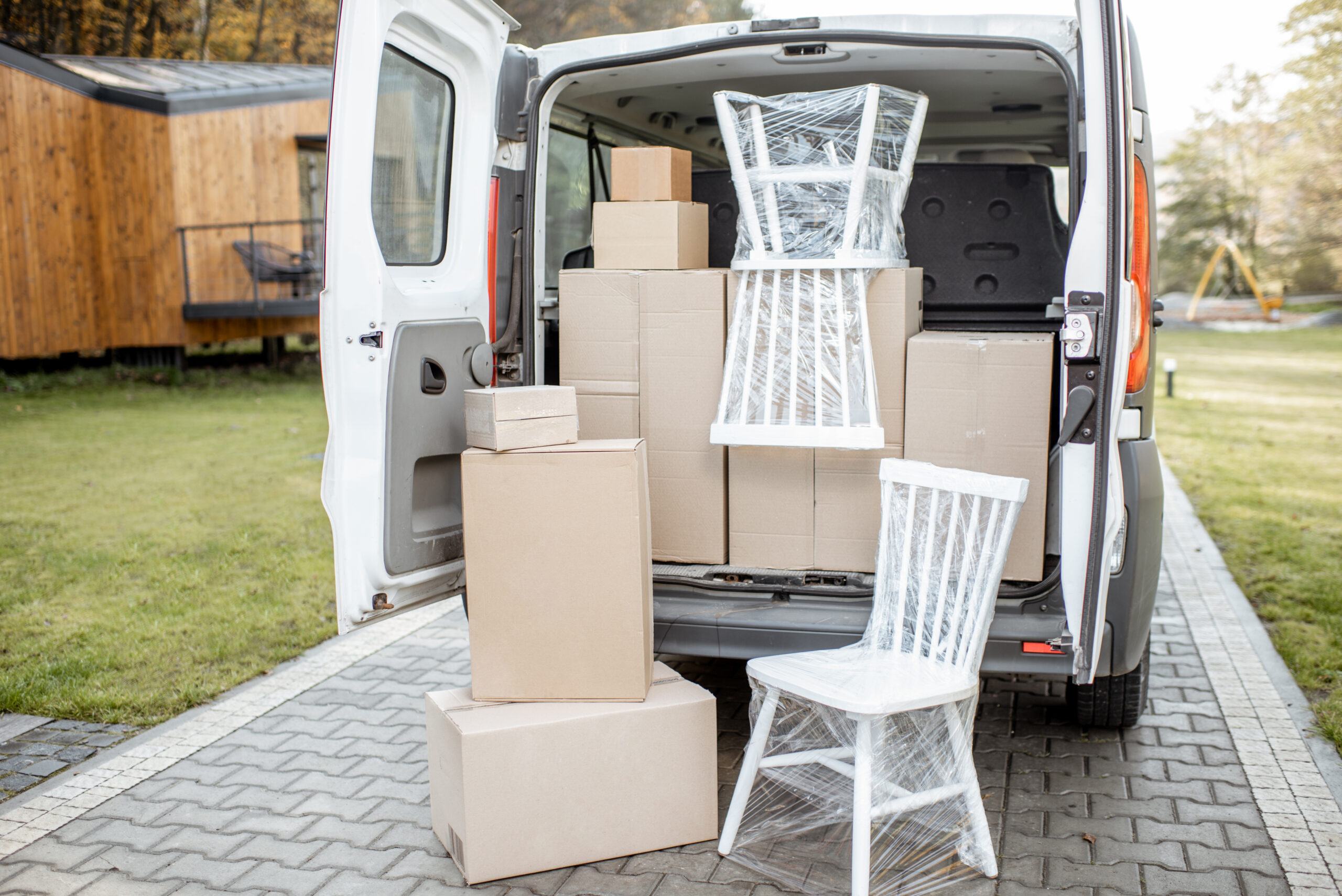 Delivery van unloading furniture