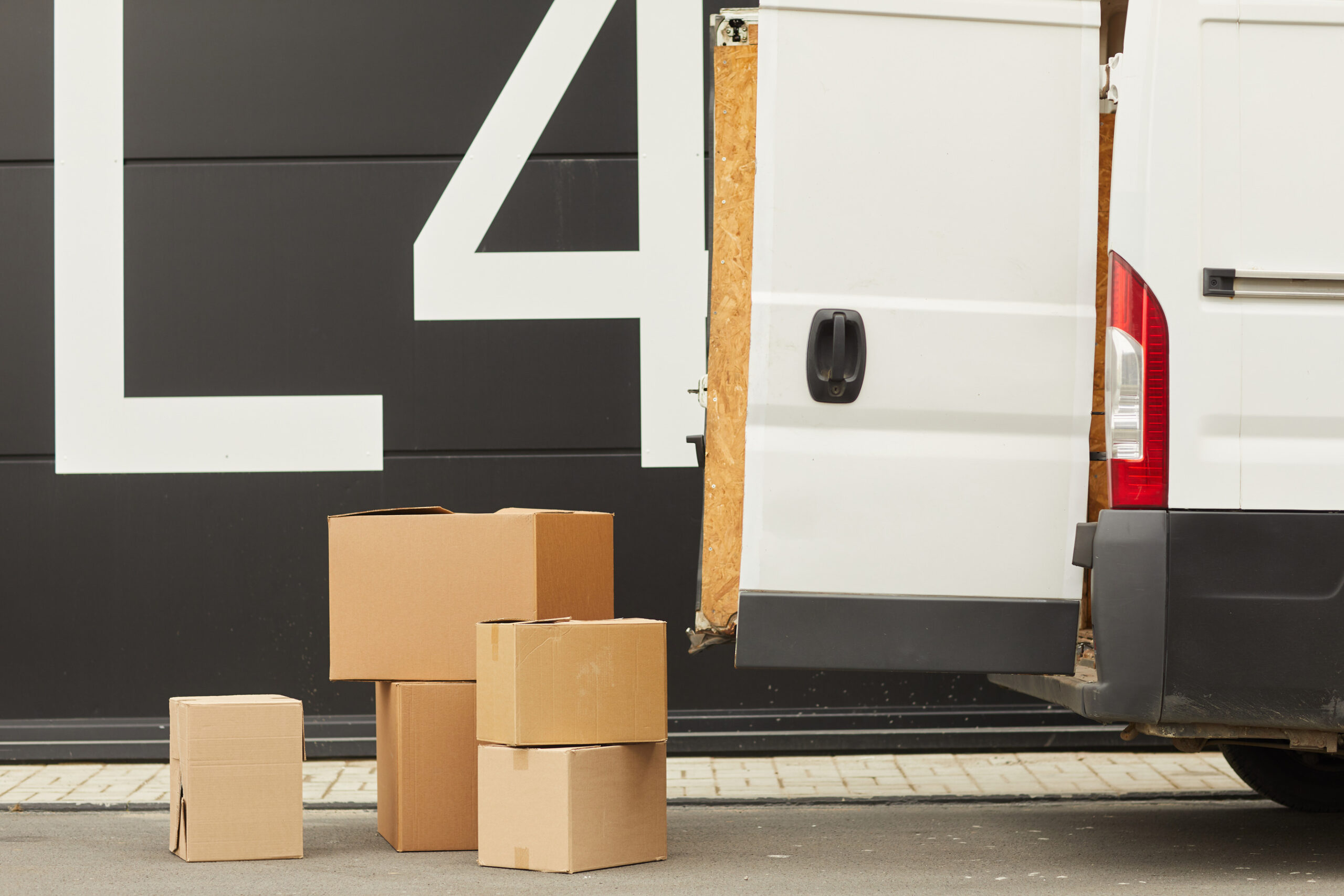 Delivery van unloading packages