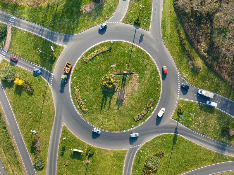 Cars going round a roundabout