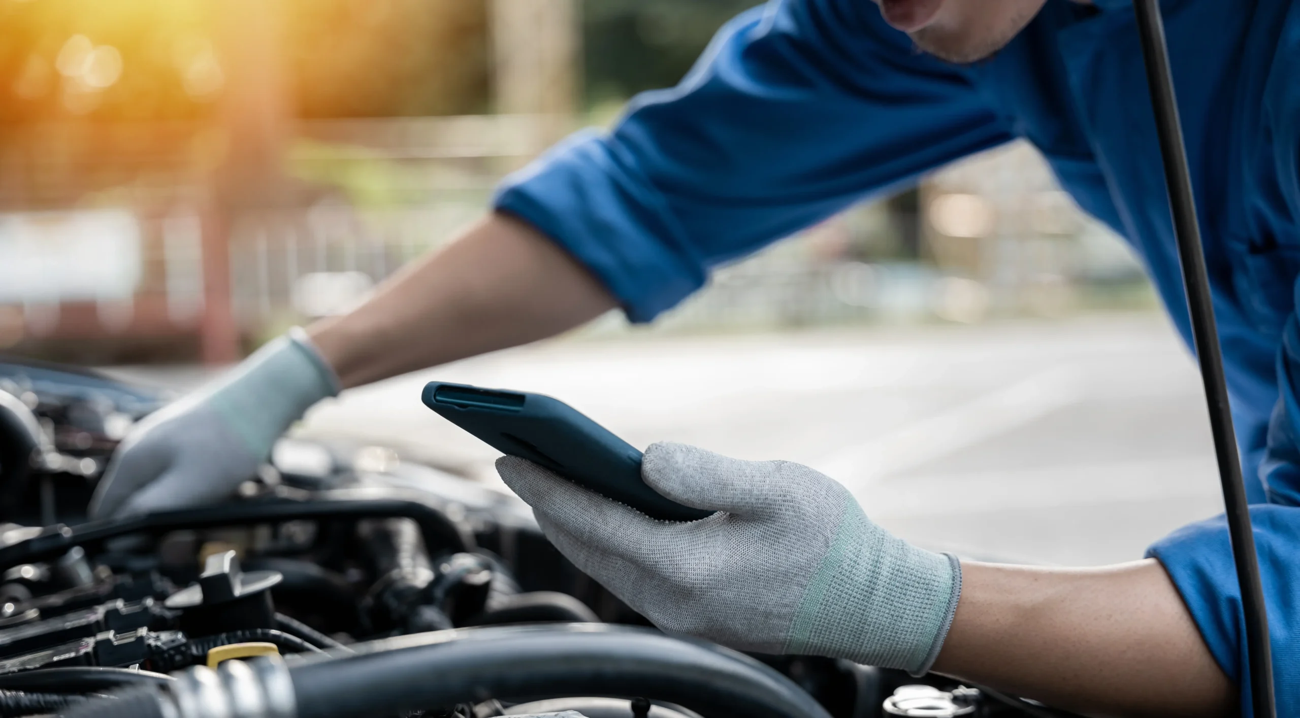Person following the Guide to Maintaining Roadworthiness during a walkaround check