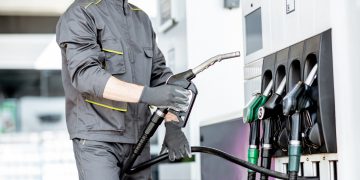 Male-Worker-Filling-up-at-station-amid-rising-fuel-prices