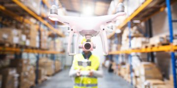 Man-Operating-Drone-Technology-to-Improve-Warehouse-Productivity-Header-Image